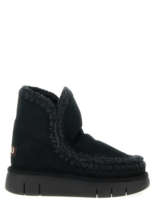 Ankle Winter Boots by Mou for women in suede lamb leather & fur black features an dynamic silhouette, showcasing the dynamic Crochet Women's Suede Lamb Leather & Fur Ankle Winter Boots design with its distinctive and elegant .