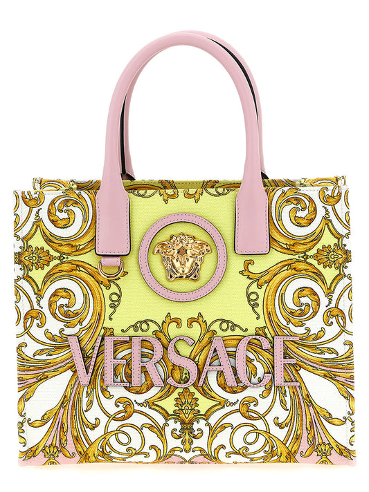 Shopper Tote Bag by Versace for women in cotton polyester canvas multicolor, signature & print features a jet-set sophisticated Medusa Cotton Polyester Canvas Shopper Tote Bag design with a secure , ample , and versatile adjustable-strap for a jet-set sophisticated finish.