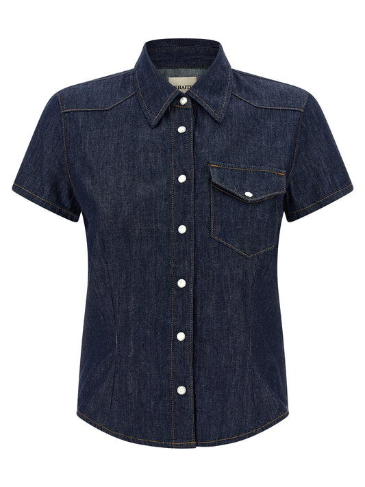 Blouse by Khaite for women in denim cotton blue showcases a sublime silhouette, artfully detailed with a sublime and short-sleeve for a sophisticated, sublime finish.