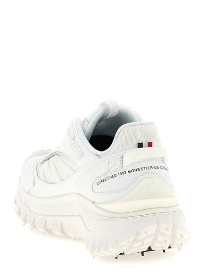 Athletic Sneakers by Moncler for men in eva & polyamide leather white showcases a architectural silhouette, artfully capturing the essence of the Men's Athletic EVA & Polyamide Leather Sneakers with its signature architectural athletic style construction.