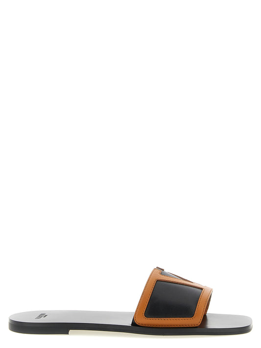 Sliders Flat Shoes by Valentino Garavani for women in lamb leather brown & signature presents a effortless chic silhouette, showcasing the Viva Superstar V Logo Women's Lamb Leather Sliders Flat Shoes design with a effortless chic and for a sophisticated look.