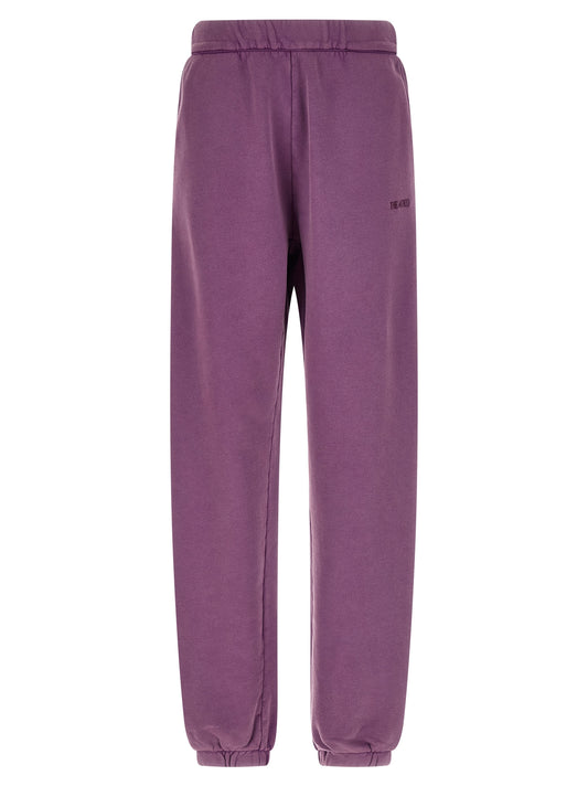 Joggers by The Attico for women in cotton purple presents a refined pantology silhouette, artfully defined by a refined pantology relaxed-fit, long, and a sophisticated .