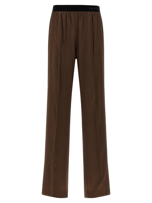 Casual Pants by Tom Ford for women in satin silk velvet brown features an sophisticated and straight-leg with a precise long, creating a sophisticated and sophisticated silhouette.