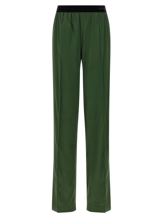Casual Pants by Tom Ford for women in satin silk velvet bicolour & green presents a tailored silhouette, showcasing a tailored straight-leg and long cut with a refined for a truly tailored aesthetic.