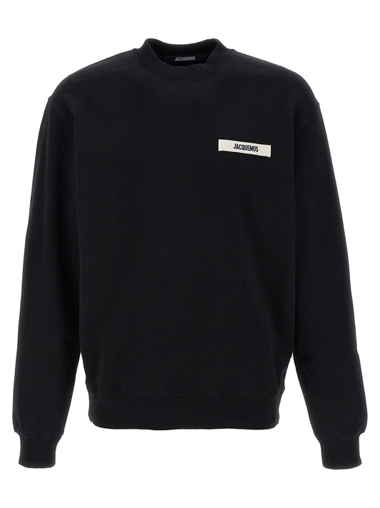 Sweatshirt by Jacquemus for men in cotton black features an provocated silhouette, detailed with a provocated and a refined crew neckline for a sophisticated aesthetic.