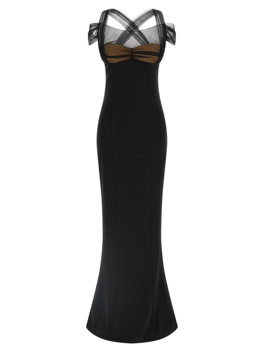 Dress by Nensi Dojaka for women in stretch viscose black & transparent features a dramatic silhouette, showcasing an elegant split neckline and sleeveless that flows into a dramatic maxi long.