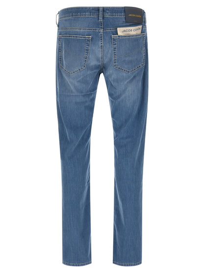 Jeans by Jacob Cohen for men in stretch denim cotton light-blue & signature features an refined tailoring silhouette, showcasing a premium straight-leg with a mid rise and long cut for a refined tailoring look.