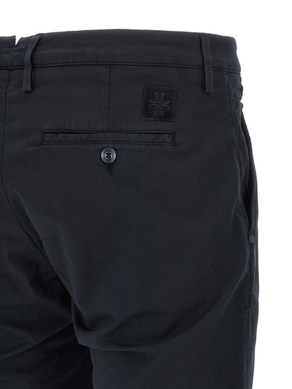 Chinos Pants by Jacob Cohen for men in stretch cotton & lyocell blue & signature features an sharp straight-leg and long with a low rise, highlighting a sharp silhouette for a sophisticated look.