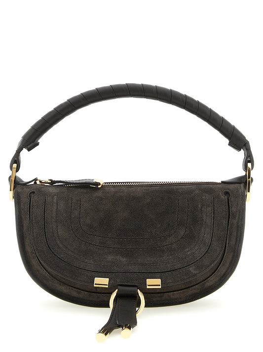Mini Crossbody Saddle Shoulder Bag by Chloé for women in suede calfskin leather brown & signature features a effortless sophistication silhouette, secured by a flap & zipper with ample external-pockets and versatile crossbody-strap, shoulder-strap, adjustable-strap & handle for a effortless sophistication finish.