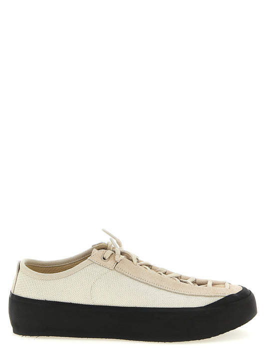 Sneakers by Stone Island for men in bos taurus suede calfskin leather & polyester beige presents a sumptuous silhouette, artfully capturing the essence of the Men's Low Top Bos Taurus Suede Calfskin Leather & Polyester Sneakers with its sumptuous low-top style design.