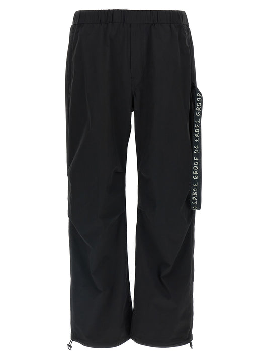 Activewear Pants by 44 Label Group for men in stretch nylon black & print features an sporty straight-leg, athletic & wide with a long and , expertly finished with for an sporty performance aesthetic.