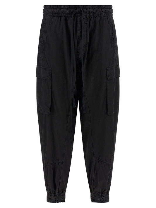 Cargo Pants by Thom Krom for men in organic cotton black features an urban chic relaxed-fit with a and long, creating a urban chic aesthetic for "Moon Behind the Hill".