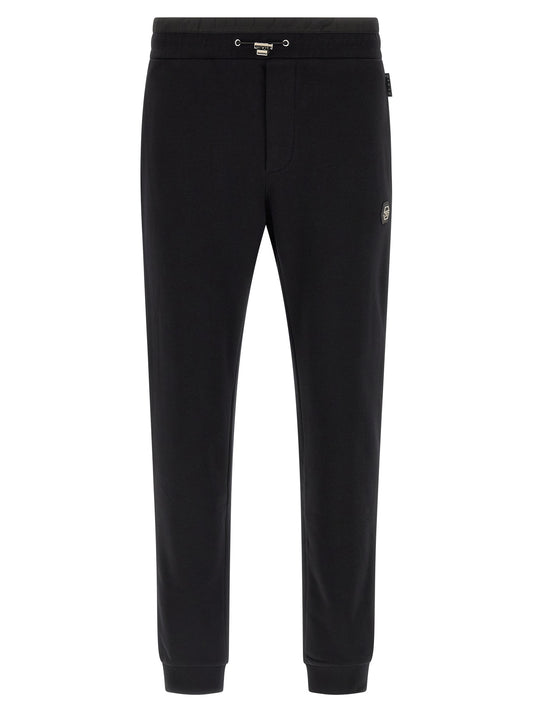 Joggers by Philipp Plein for men in cotton polyester black features an sophisticated and with a precise long, creating a sophisticated and sophisticated silhouette.