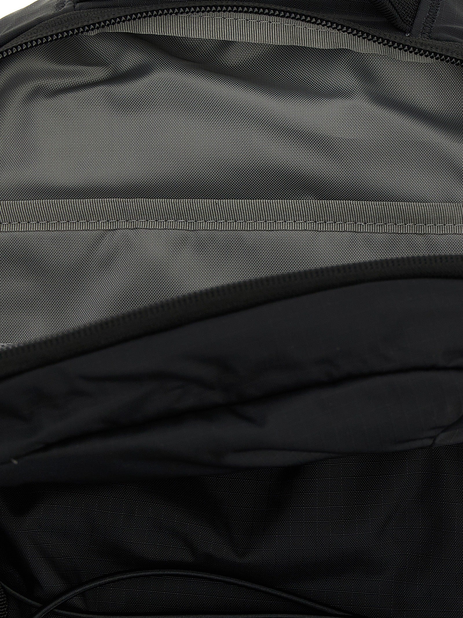 Mini Backpack by The North Face for unisex in plush nylon black features a effortlessly chic Borealis Plush Nylon Mini Backpack design, showcasing a secure , ample , and versatile backpack-strap & adjustable-strap for a effortlessly chic finish.