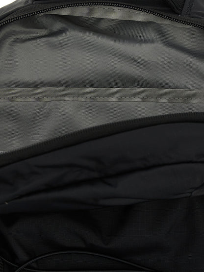 Mini Backpack by The North Face for unisex in plush nylon black features a effortlessly chic Borealis Plush Nylon Mini Backpack design, showcasing a secure , ample , and versatile backpack-strap & adjustable-strap for a effortlessly chic finish.