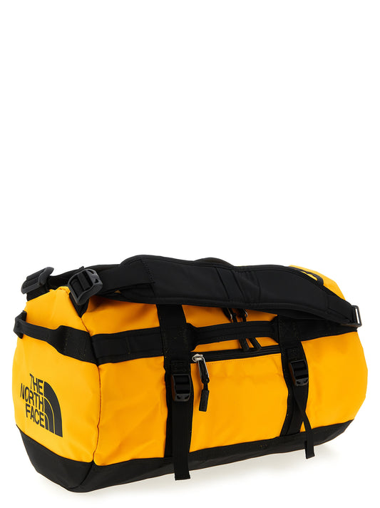 Flap Backpack by The North Face for unisex in lyocell bicolour & yellow showcases an architectural Lyocell Flap Backpack design, featuring a secure flap & zipper, ample , and architectural backpack-strap, adjustable-strap & handle for a sophisticated look.