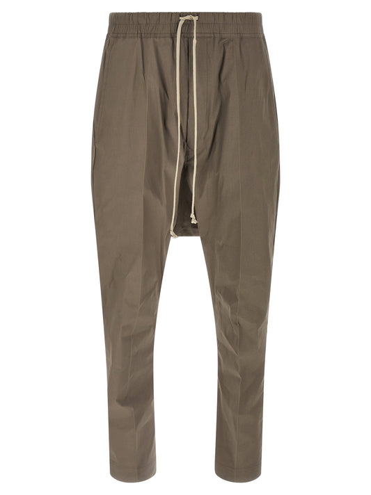 Casual Pants by Rick Owens for men in stretch cotton gray presents a tailored silhouette, showcasing a tailored and long cut with a refined for a truly tailored aesthetic.