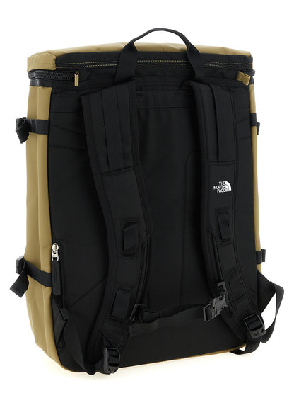 Backpack by The North Face for unisex in polyester bicolour & green showcases an architectural Base Camp Fuse Box Polyester Backpack design, featuring a secure zipper & buckle, ample , and architectural handle, backpack-strap & adjustable-strap for a sophisticated look.