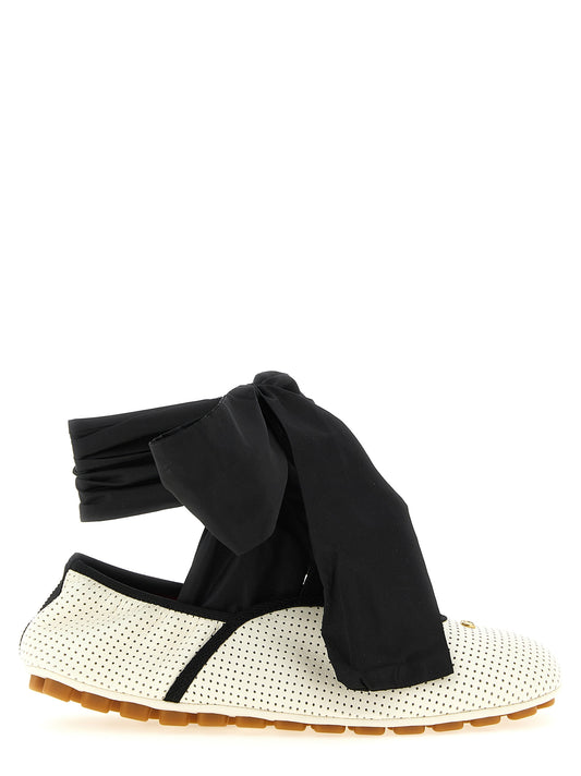 Ballet Flat Shoes by Valentino Garavani for women in lamb leather bicolour, black, white & signature presents a effortless chic silhouette, showcasing the Ribbon V Logo Women's Lamb Leather Ballet Flat Shoes design with a effortless chic and square toe style for a sophisticated look.