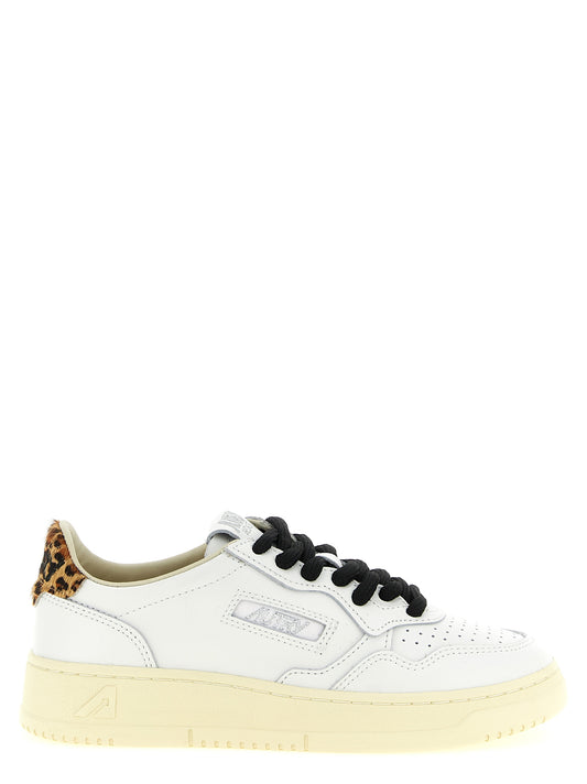 Sneakers by Autry for women in bos taurus cowhide leather animal, brown, signature & print features an versatile design from the Pony Women's Low Top Bos Taurus Cowhide Leather Sneakers collection, highlighting a versatile low-top style for a premium, high-fashion look.