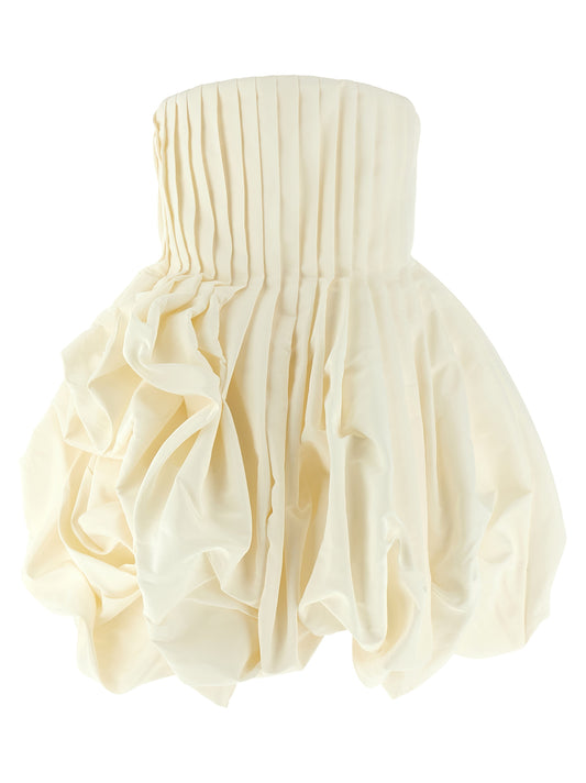 Dress by Carolina Herrera for women in silk pink & white features an cute silhouette, detailed with a and that elegantly flows into a cute short.
