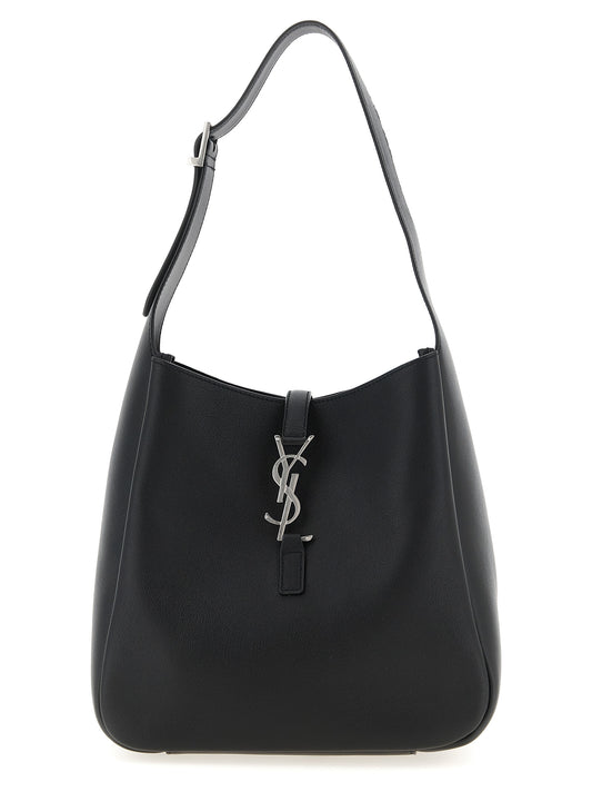 Micro Shoulder Clutch Bag by Saint Laurent for women in suede calfskin leather black presents a versatile silhouette, showcasing a secure and versatile with versatile shoulder-strap, adjustable-strap & handle for a sophisticated look.