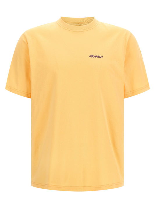 T-Shirt by Gramicci for men in cotton orange & print showcases a dramatic silhouette, elegantly detailed with a dramatic crew neckline and short-sleeve for a truly dramatic finish.