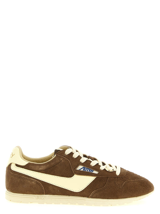 Athletic Sneakers by Autry for men in nylon cotton terry & suede cowhide leather brown & jacquard showcases a architectural silhouette, artfully capturing the essence of the Men's Athletic Nylon Cotton Terry & Suede Cowhide Leather Sneakers with its signature architectural athletic style construction.