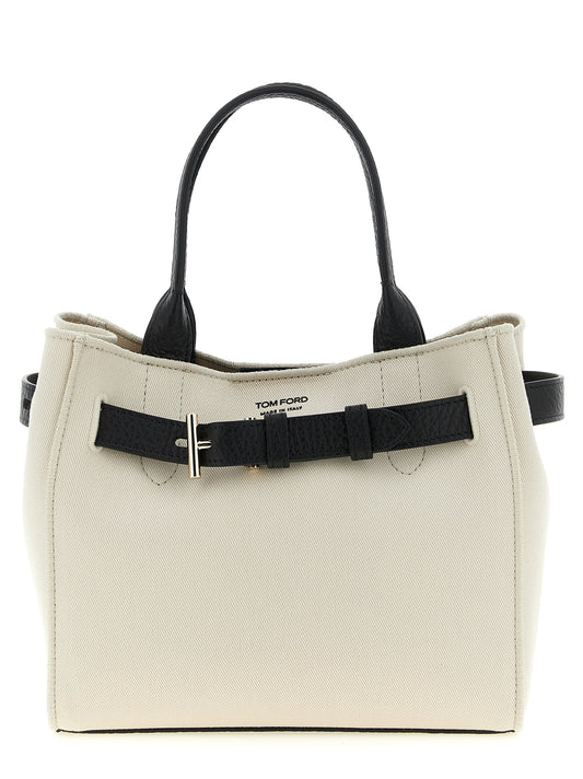 This Shopper Tote Bag by Tom Ford for women in cotton polyester canvas bicolour, black & white features an jet-set Audrey Cotton Polyester Canvas Shopper Tote Bag design with a secure magnetic & buckle, ample , and jet-set shoulder-strap, adjustable-strap & handle.
