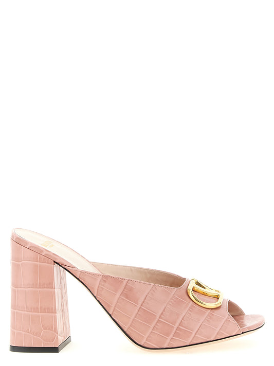 Stiletto Slider Sandals by Valentino Garavani for women in crocodile calfskin leather multicolor, pink & signature presents a sculptural silhouette, showcasing the V Logo Women's Crocodile Calfskin Leather Stiletto Slider Sandals design with a sculptural stiletto and for a premium look.