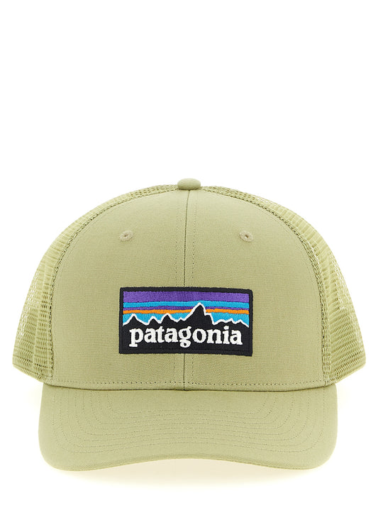 Trucker Cap by PATAGONIA for men in polyester & organic cotton bicolour & green features a timeless silhouette, artfully capturing the essence of the timeless Polyester & Organic Cotton Trucker Cap design with a sophisticated style.