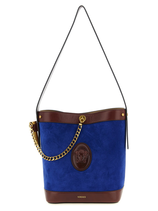 Shoulder Bucket Bag by Versace for women in calfskin leather blue showcases a statuesque silhouette, artfully detailed with a secure magnetic, organized , and versatile shoulder-strap & handle for a statuesque look.