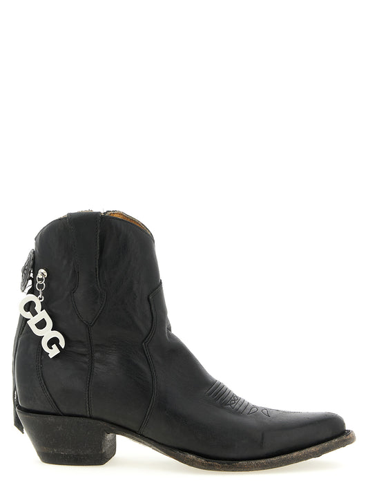 Ankle Chelsea Boots by Comme Des Garçons for women in cowhide leather black features an enchanting design from the Women's Cowhide Leather Ankle Chelsea Boots collection, highlighting a enchanting and for a refined look.