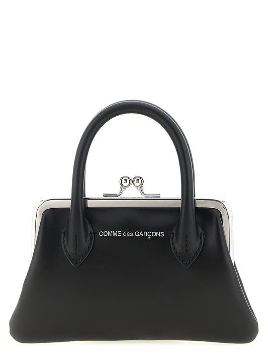 Cardholder Card Case by Comme Des Garçons for women in leather & metal black features a distinguished silhouette, showcasing the distinguished design of the Leather & Metal Cardholder Card Case with refined card-organization coin-purse.