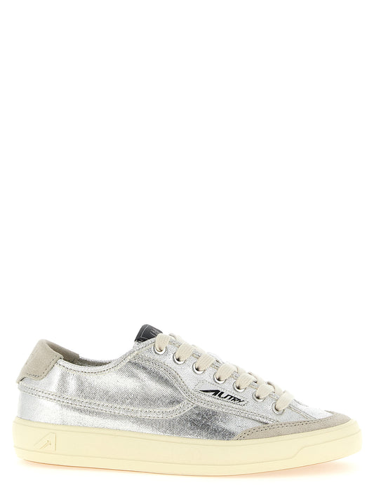 Sneakers by Autry for women in suede leather & canvas silver features a chic design, perfectly showcasing the chic low-top style of this Women's Low Top Suede Leather & Canvas Sneakers.
