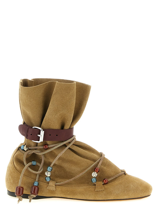 Flat Ankle Strap Boots by Isabel Marant for women in resin & suede calfskin leather beige showcases a impeccable silhouette as Women's Resin & Suede Calfskin Leather Flat Ankle Strap Boots, artfully defined by a impeccable flat and a impeccable .