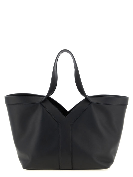 Small Tote Bag by Saint Laurent for women in suede calfskin leather black showcases a urban-chic Essence Suede Calfskin Leather Small Tote Bag design, featuring a secure snap, ample , and versatile handle for a urban-chic finish.