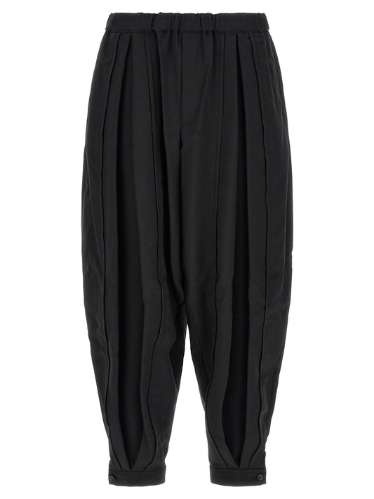 Trousers by Comme Des Garçons for men in polyester black features a tailored silhouette with a tailored , defined by its long and a sophisticated .