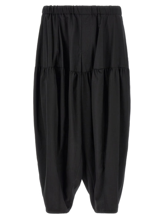 Trousers by Comme Des Garçons for men in polyester black features an on trend silhouette, showcasing a sophisticated with a long and for an on trend finish.