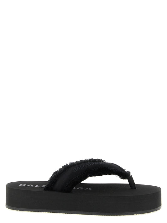 Sliders Sandals Flat Shoes by Balenciaga for women in silk viscose satin & tu black presents a impeccable silhouette as Women's Silk Viscose Satin & TU Sliders Sandals Flat Shoes, artfully designed with a and a impeccable for a refined, upscale finish.