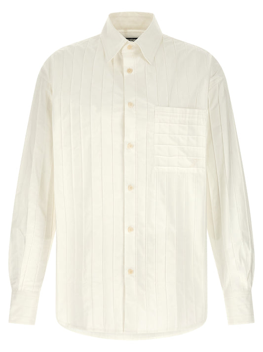 Shirt by Jacquemus for men in cotton horn, white & striped showcases a sharp silhouette, elegantly detailed with a sharp and sharp long-sleeve.