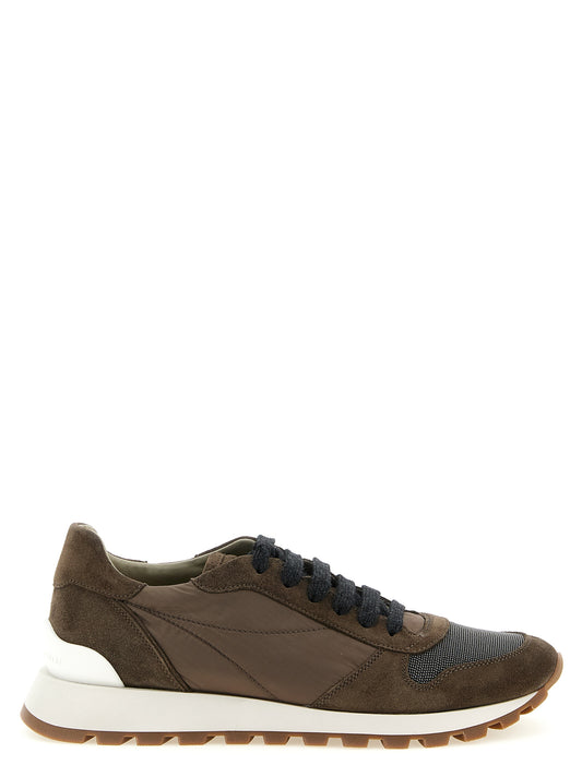 Athletic Sneakers by Brunello Cucinelli for women in bos taurus calfskin suede leather & tu bicolour & green showcases a architectural silhouette, artfully capturing the essence of the Women's Athletic Bos Taurus Calfskin Suede Leather & TU Sneakers with its signature architectural athletic style construction.
