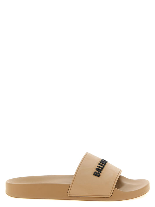 Sliders Sandals Flat Shoes by Balenciaga for women in thermoplastic polyurethane beige showcases a enchanting silhouette as part of the City Women's Thermoplastic Polyurethane Sliders Sandals Flat Shoes collection, defined by a enchanting and for a enchanting look.