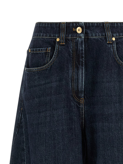 Jeans by Brunello Cucinelli for women in cotton denim blue presents a refined pantology silhouette, artfully defined by a refined pantology wide, long, and a sophisticated high rise.