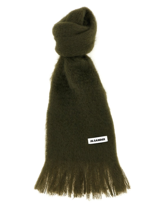 Scarf by Jil Sander for women in mohair wool & polyamide bicolour & green features a snug silhouette, perfectly showcasing the elegant drape and premium finish of the Mohair Wool & Polyamide Scarf.