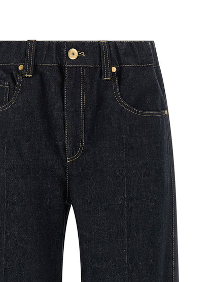 Jeans by Brunello Cucinelli for women in denim cotton blue & signature presents a tailored silhouette, showcasing a tailored straight-leg & wide and long cut with a refined for a truly tailored aesthetic.