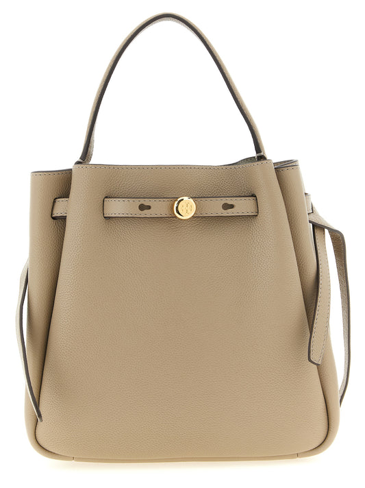 Bucket Handbag by Tory Burch for women in suede leather beige features an refined silhouette, showcasing a secure magnetic, ample , and versatile shoulder-strap, handle, adjustable-strap & belt-strap for a sophisticated refined aesthetic.