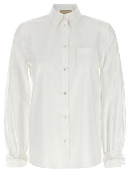 Blouse by Valentino Garavani for women in cotton white & signature presents a discerning silhouette, showcasing a sophisticated and for a truly discerning finish.