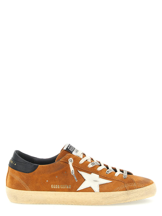 Sneakers by Golden Goose for men in cowhide suede leather orange & signature presents a sumptuous silhouette, artfully capturing the essence of the Star Men's Low Top Cowhide Suede Leather Sneakers with its sumptuous low-top style design.