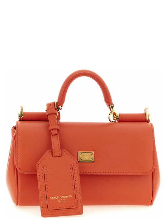 Mini Flap Handbag by Dolce & Gabbana for women in bos taurus calf suede leather orange presents a ornamental silhouette, showcasing a secure flap, ample , and versatile for a ornamental finish.